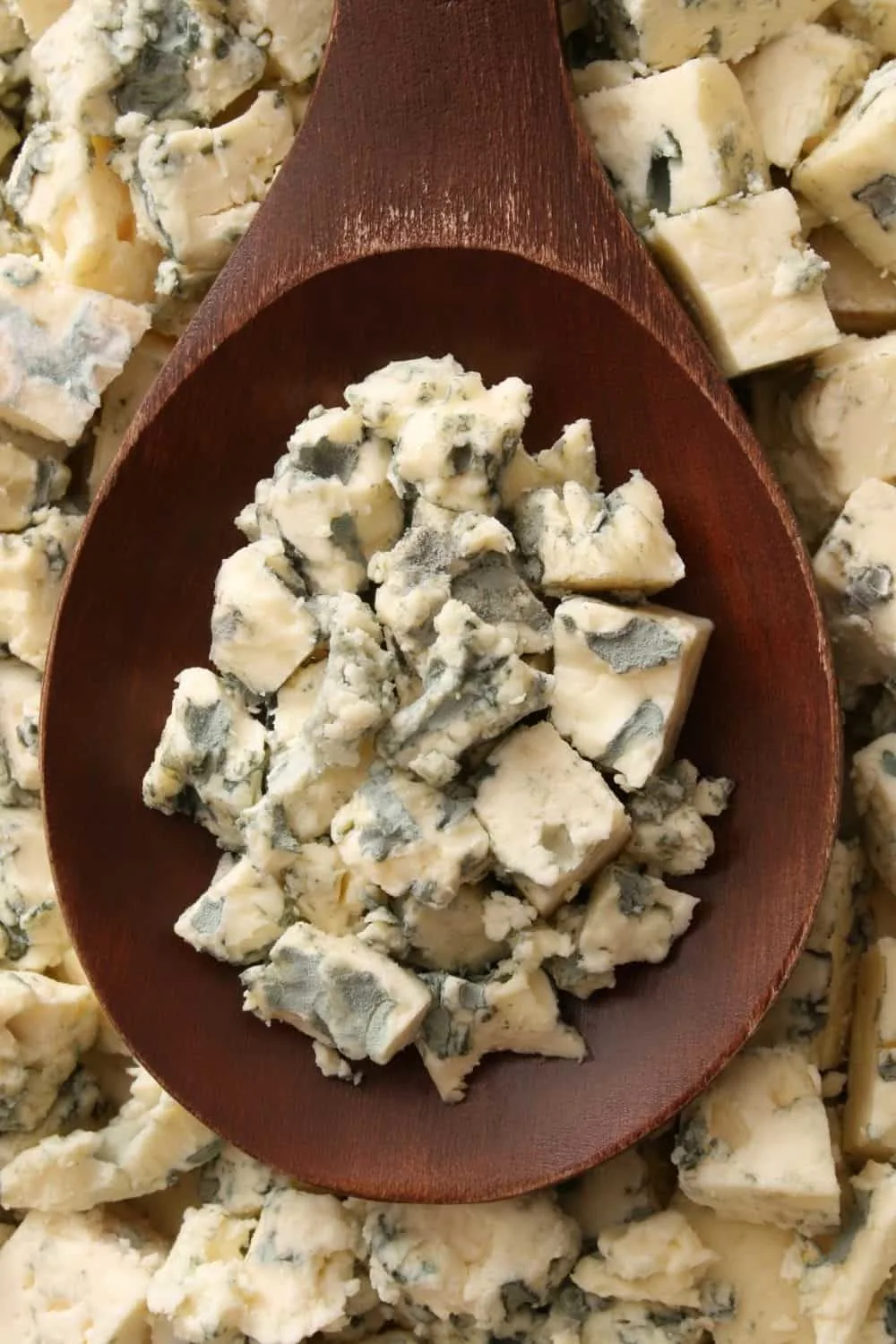 Does blue cheese go bad if not refrigerated